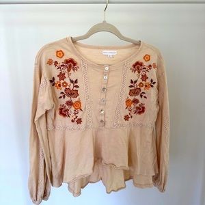 Versona high low embroidered top